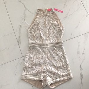 Nude with white lace romper